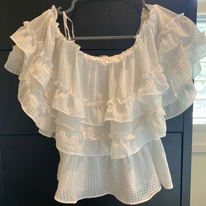 White ruffle blouse
